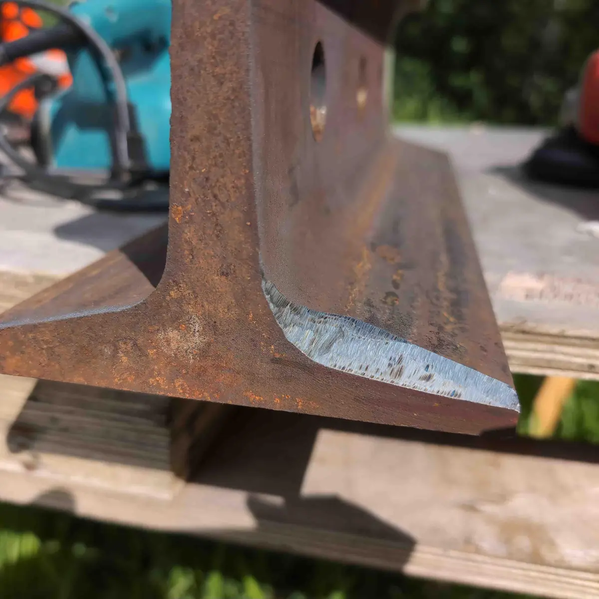 One bevel of a hot cut ground up to the center line.